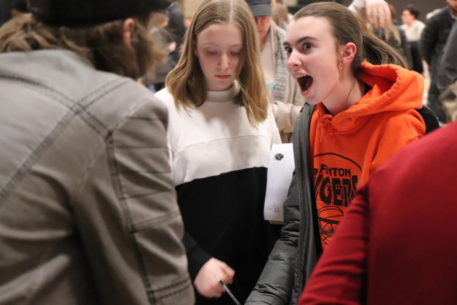 Sophomore Addie Wright enjoys the incoming freshman orientation by talking to past and current teachers. Wright and the other students enjoy their time in the main gym-- which is where the orientation was-- on Feb. 5. 