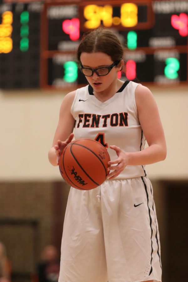Eyes on the ball, sophomore Lauren Gangwer prepares for a free throw. The Tigers lost in a close game against Flushing 30-34 on Feb. 27.