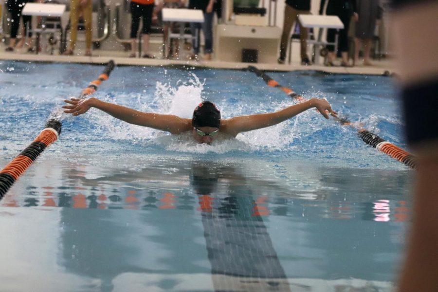 Senior Joel Diccion competes at the swim meet on Feb. 28 at the FHS pool. Joel got first place for this heat.