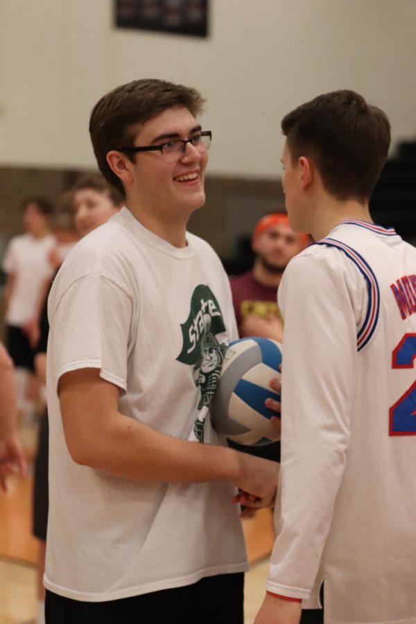 After playing their match in the Powder Tuff tournament, senior Bradley Trecha shakes hands with senior Jacob Boulay. The Fenton High hosted the Powder Tuff tournament on Feb. 24 where the seniors beat the juniors in the championship game.