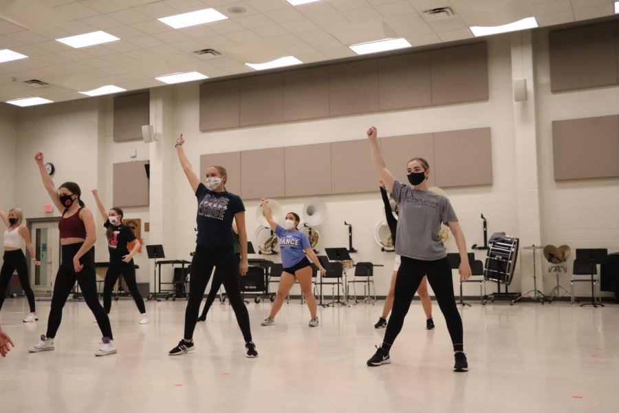 The 2020-21 Fenton Dance Team practices their routine in preparation for the Pistons Competition on Oct 2. The Dance Team uses the band room for rehearsal on Fridays.