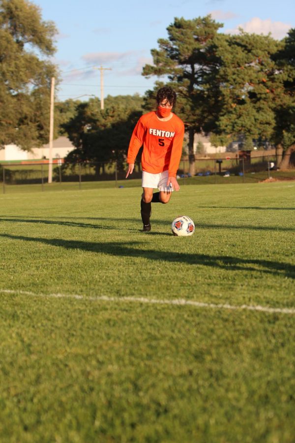 Sophomore Ryan Stocker gets ready to kick the ball to his teammates. On Oct. 7, the FHS JV soccer team won 7-0 against Brandon.