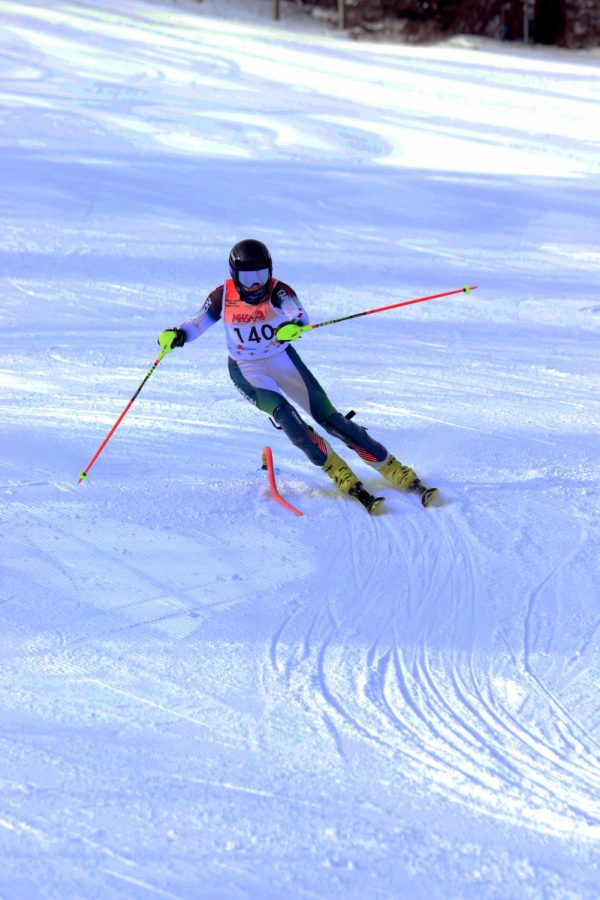 Sophomore Brooks Funke races and competes in regionals on Feb 10. The Varsity boys and girls ski team now goes on to States.