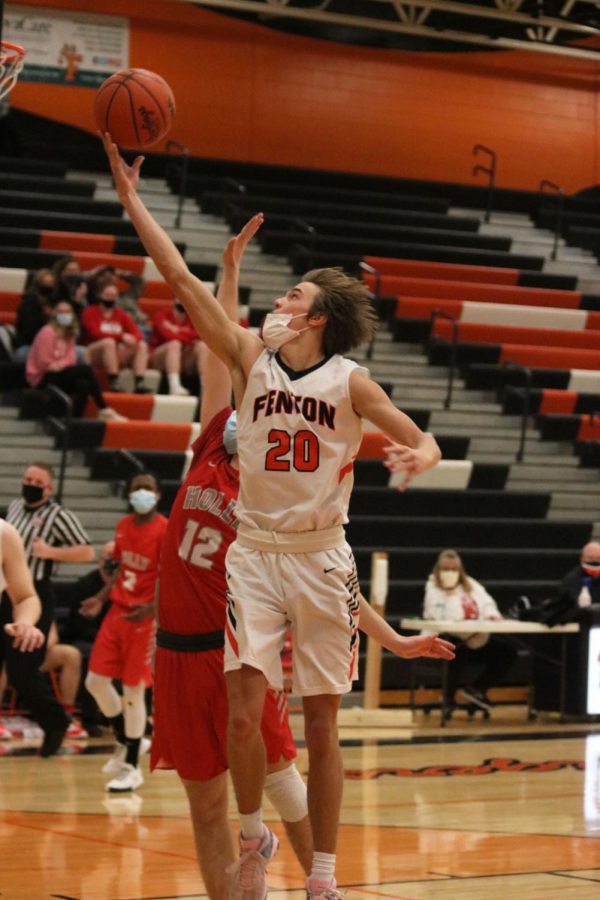Senior Noah Sage goes in for the layup during the Tigers boy Varsity basketball game against the Bronchos. On Feb 17 the Tigers beat the the Bronchos 51-45. 