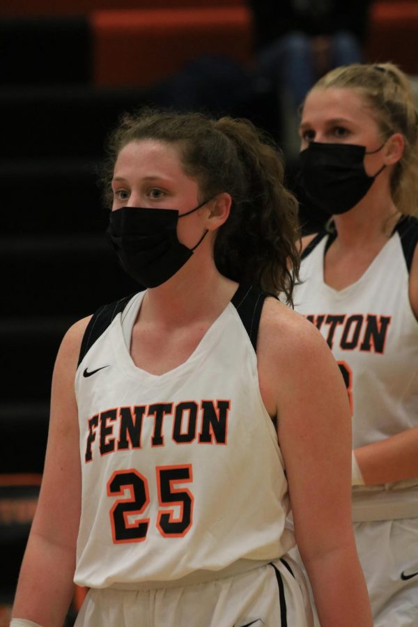 Senior Kyla Lynch prepares to make her next play for the Tigers on February 26th, 2021 in the Fenton High School main gym. 