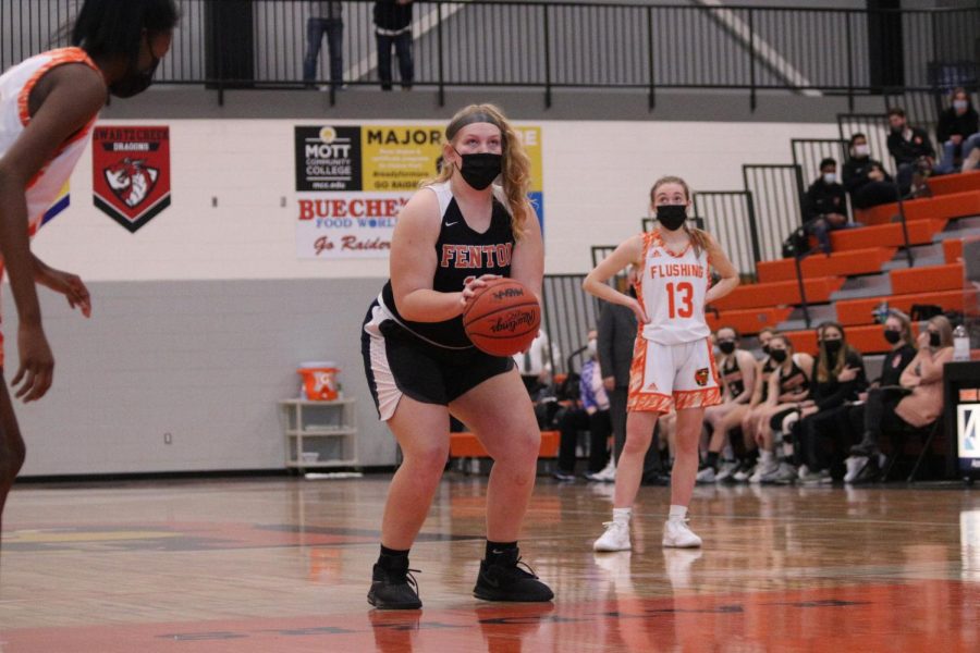 At the line,, senior Jillian McVey prepares to shoot a free throw. On Mar. 16 the Tigers lost to the Flushing Raiders. 