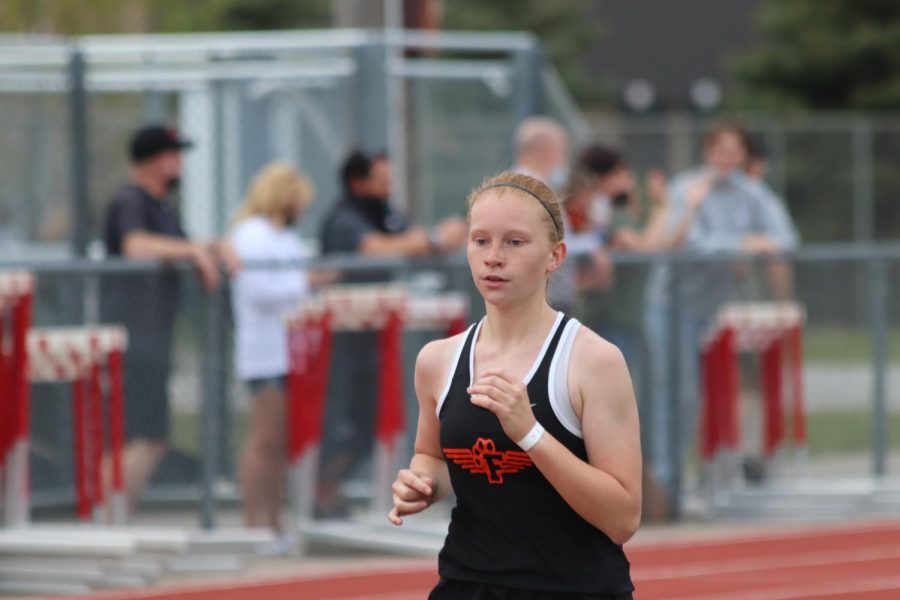Freshman Nina Frost wins the 2 mile event. Fenton beats Linden in the track meet on April 27.
