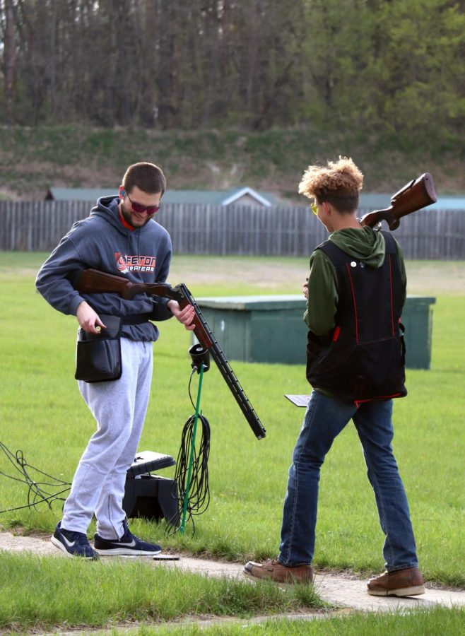 Junior Adam Dickie gets ready to load a new round of shots during one of the Trap Teams first get together of the year. On 22 April the boys enjoyed shooting in some chilly weather.