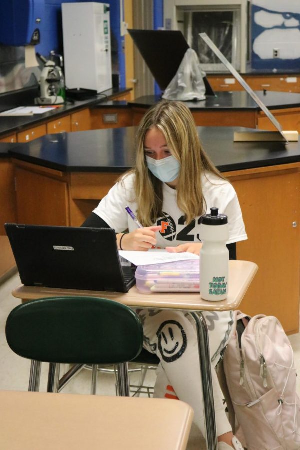 Junior Isabella Vincil works on completing her packet on Oct. 18.  In anatomy they are learning the parts of the brain and how they function.  