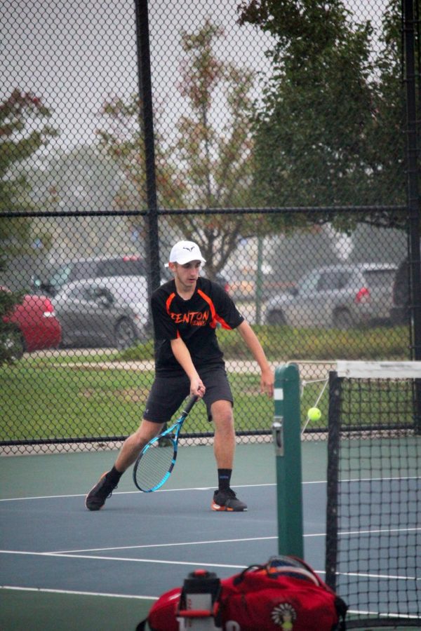 Junior Remington Book returns a serve and tries to score a point. On Oct 7. the varsity tennis team participated in Regionals and finished in fourth place. 