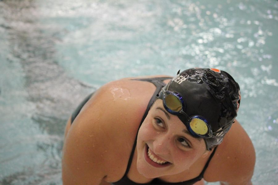 Senior Halee Alexander finishes her race, the 200 yard freestyle on Oct. 14, 2021. The swim and dive team won their meet against Swartz Creek.