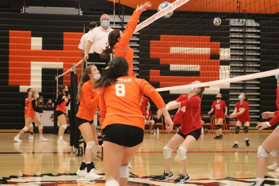 Jena Fijolek blocks a pass from Holly. On Oct. 20, the Fenton junior varsity volleyball team defeated the Holly Broncos 3-0. 