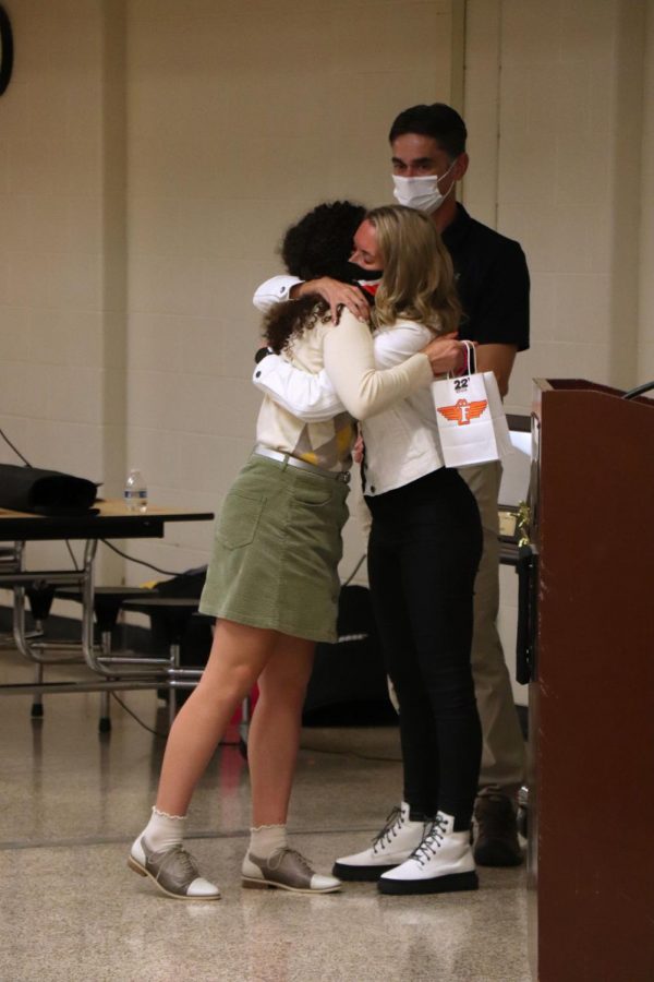 Senior Angelina Vitarelli hugs coach Jennifer Brzezinski while getting her senior gift. On Nov. 10, the cross country team had their banquet after their season ended. 