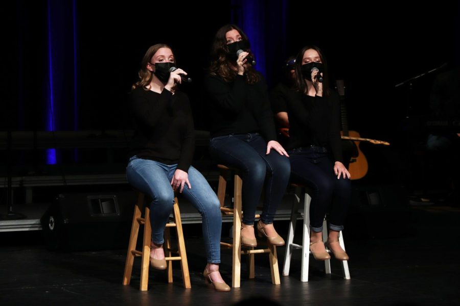 Sophomores Macy Wright, Marlo Risner and Emma Minock sing their trio. On November 20, the Fenton Ambassadors had their first concert of the year. 