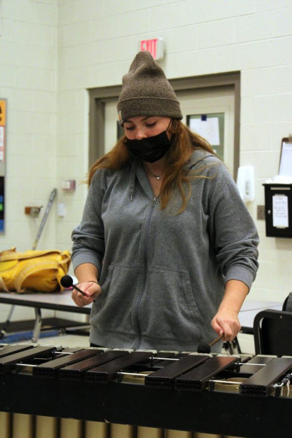 Senior Audrey Maclean warms up in preparation for her drumline audition.  On Nov. 10, Maclean tried out along with other students at Fenton High School to be a part of drumline. 