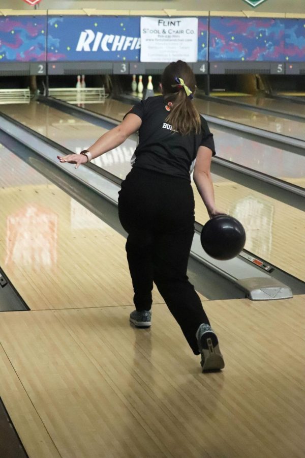 Junior Madelin Burnau steps up to the foul line. On Dec. 4, the girls varsity bowling team competed against the Linden girls, winning their first match. 