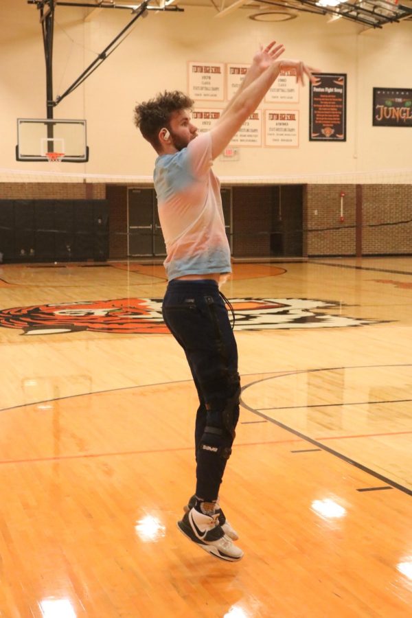 During gym class on Jan. 7, senior Austin Firby takes a shot. This was in free time during gym teacher Chad Logans class. 
