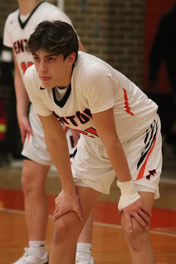 Freshman Chaz Weddle prepares for the next play while playing against Corunna HS. The FHS boys freshmen basketball team went up against Corunna on Feb. 1 and won 52-46. 