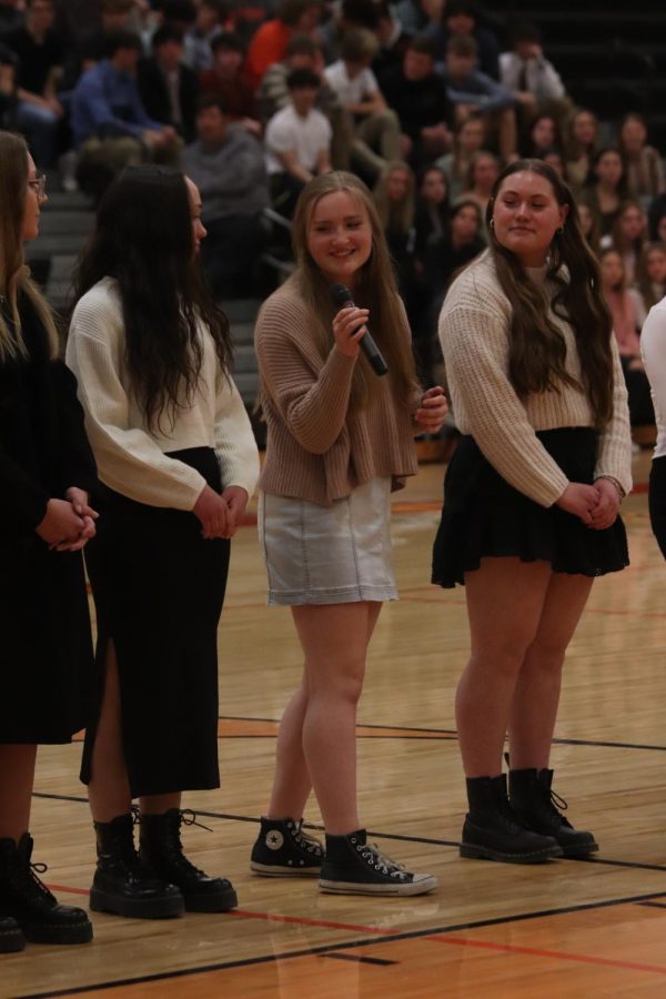 Introducing herself, sophomore Carli Best stands alongside her teammates. On March 22, the spring sports teams were announced at Meet The Team. 