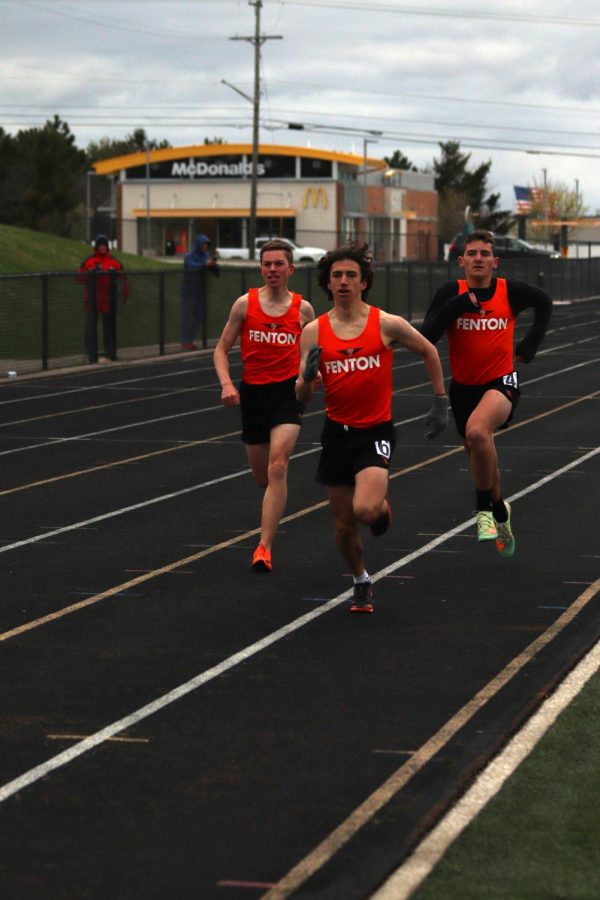 Working together senior Jake Lesser, freshman Owen Cox, and senior Gavin Thomas sprint to the finish line. On April 26, the FHS Boys Track team ran against Linden and won 88-49. 
