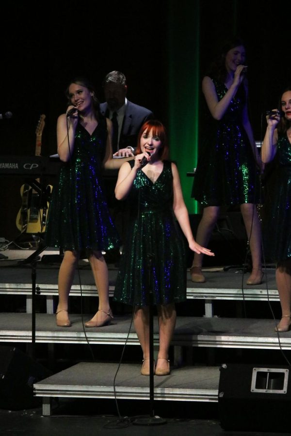 Dancing and singing, senior Sky Hodgkin performs in the Ambassadors concert. The Ambassadors had their last concert of the year, The Finale Show, on May 6-7. 