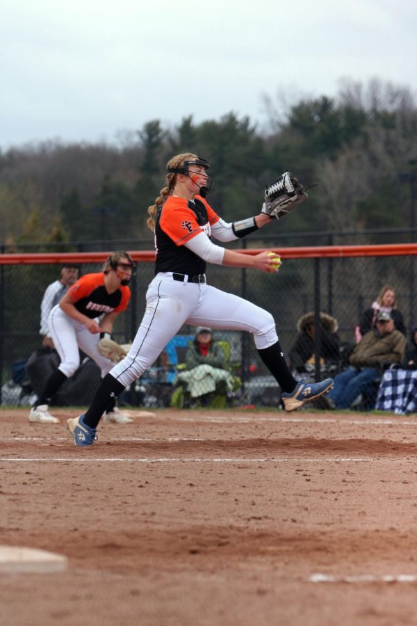 Begining the play, junior Tamara Craven pitches the ball to the opposing team. On May 2, the Fenton Tigers varsity softball team played the Linden Eagales; after going into an extra-inning tiebreaker, the Tigers lost 9-4. 