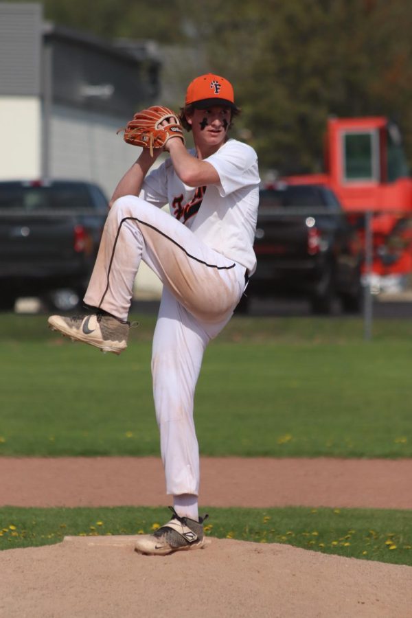 Winding up, freshman Connor McDermott pitches. On May 10, Fentons freshman baseball split a double header against Flushing, losing 1-2 and winning 6-3. 
