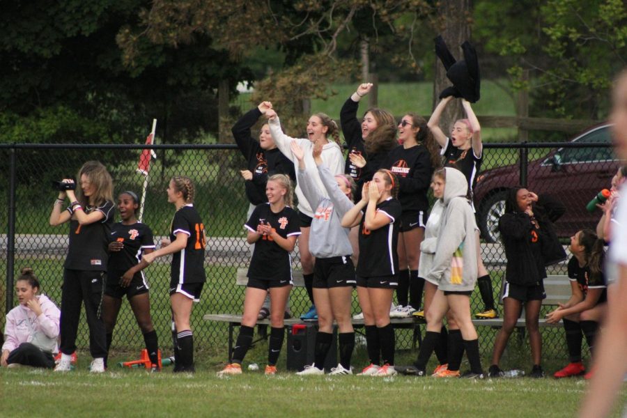 After scoring a goal, the bench cheers in celebration. On May 25, the varsity girls soccer team played Bradon for their first district game and won 2-0.