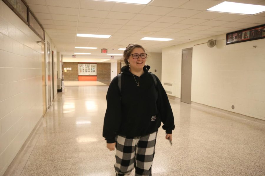 Walking, junior Caitlyn Wentz wears pajamas. On Sept, 28. students of FHS participated in a pajama spirit day for homecoming week. 