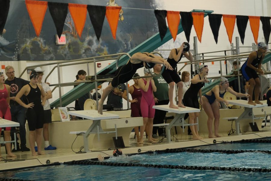 Diving in, senior Sana Saab taking off in the 200 medley relay. On Nov, 5. Saabs relay placed first with a time of 1:51.58. 