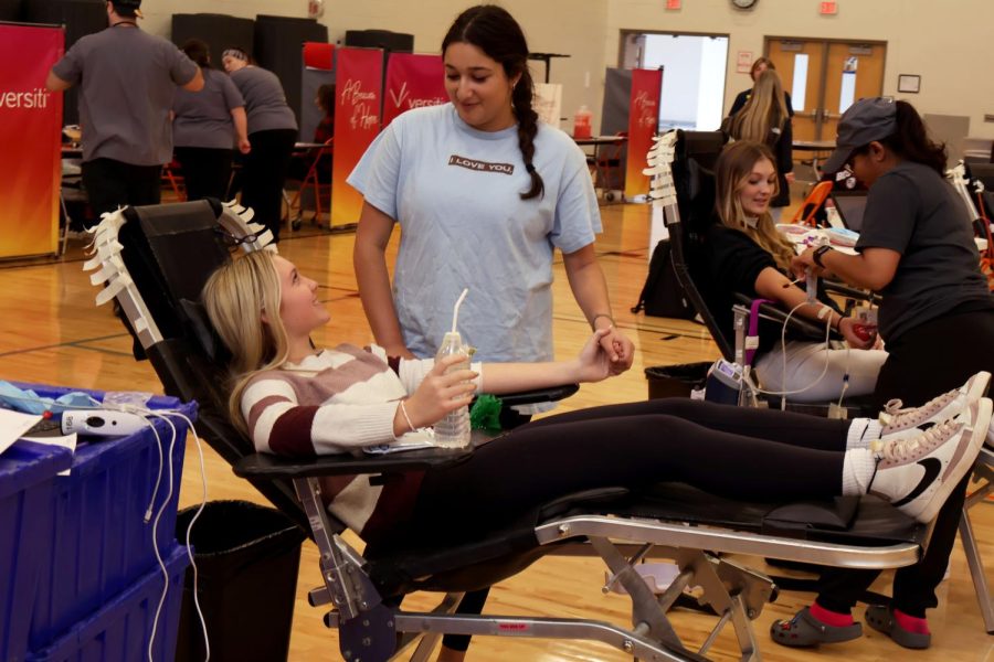 On Nov. 11, FHS hosted a blood drive for students to donate blood. Sophomore Madeline Knight looks up at senior Anika Guru. 
