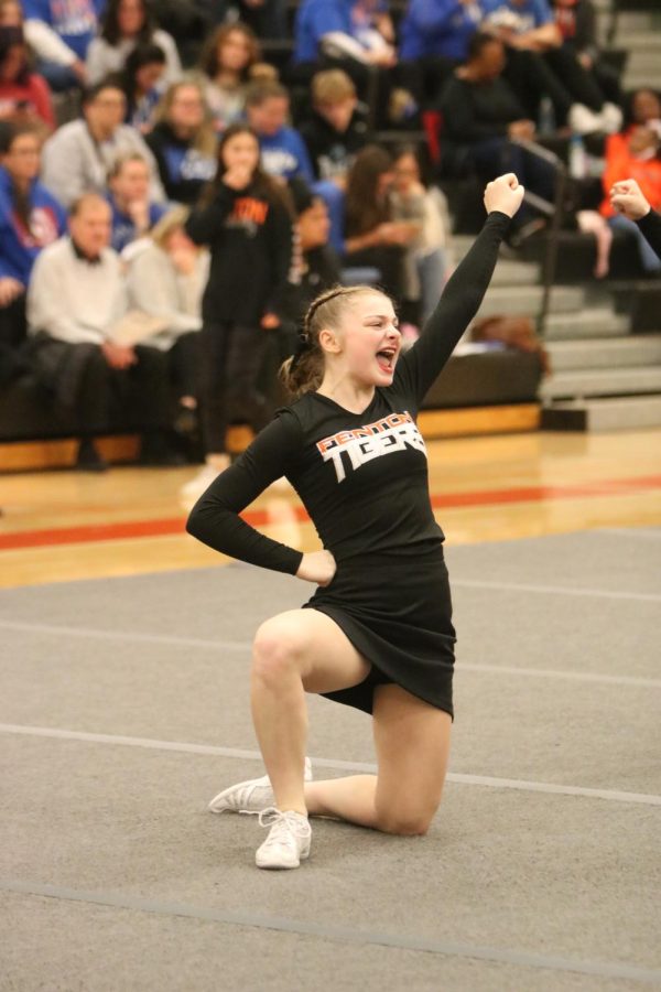 Freshman Evie Metcalfe cheers to the crowd. On Dec 10, Fenton took on fourteen teams and took sixth overall with a score of 692.50. 