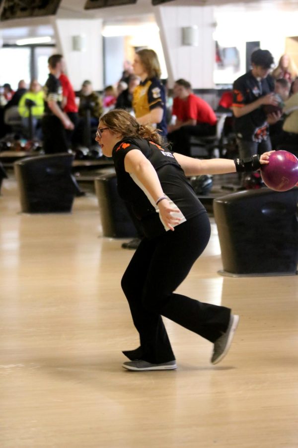 Junior Katelyn Wentz approaches the bowling lane. On Jan. 14, the Fenton girls varsity bowling team bowled against Goodrich at Holly Lanes.