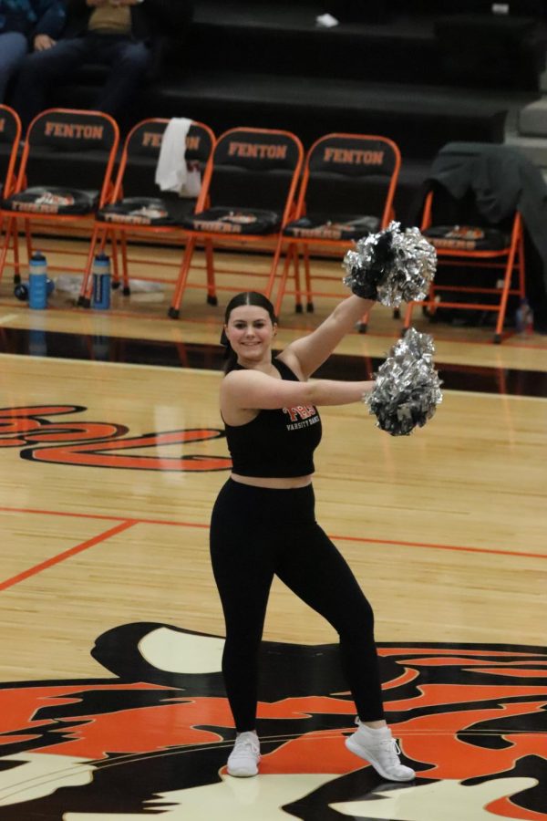 Dancing at the halftime show,  freshman Jenelle Lemon. On Feb 17 the dance team performs during halftime for the home varsity boys basketball. 
