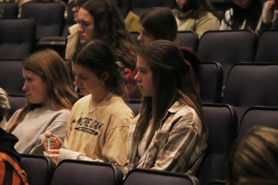 Listening+to+the+counselors+sophomores+Paige+Harrison+and+Payton+LaRowe+learn+about+scheduling+classes.+On+Feb.+9%2C+there+was+a+sophomore+class+meeting+for+schedules+for+the+2023-24+school+year.+