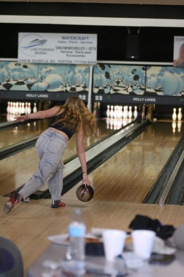 Sophomore Addison McCabe approaches the bowling lane. On March. 20, the FHS bowling team had their banquet at Holly Lanes.