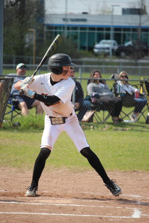 Swinging his bat, freshman Bennett Gudith hits the ball. On May 5. the Freshman boys
 baseball team competed against Linden. 