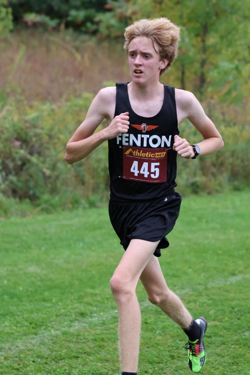 Running, junior Justin Perantoni completes his run at the 2nd League Jamboree. On Sept. 27, the team competed at Linden High.