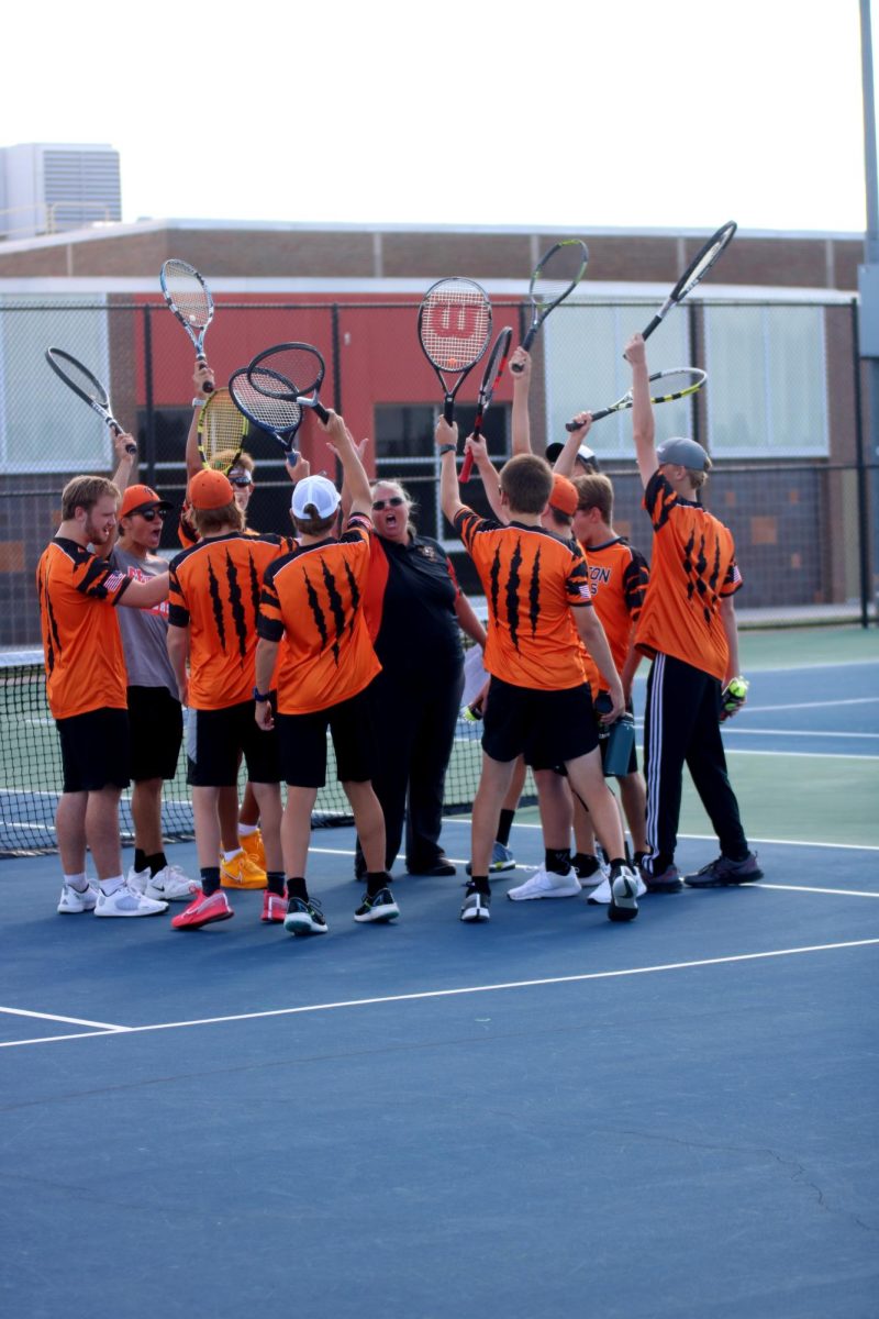 Coach Renee Hand fires up her team on before the match against Kearsley. On Sept. 14, Fenton defeats Kearsley at Fentons home  courts 5-3.