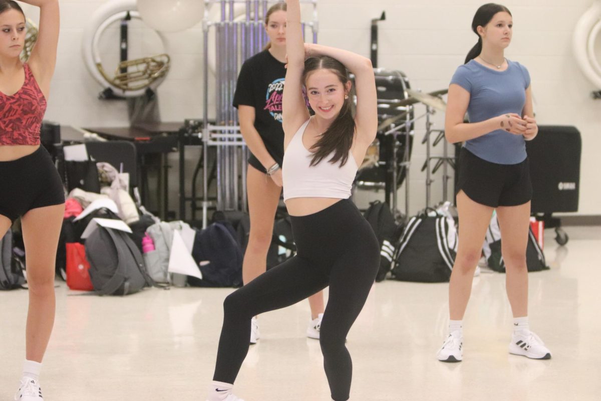 Practicing her dance routine, Sophomore Sanibel Stack poses for the routine. On Sept. 29. Stack rehearsed at dance practice with her team.
