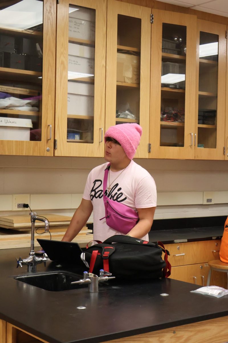 Wearing pink junior Alfred Boss participates in his grade color wars. On Oct.5, Fenton Highschool students had color war day for homecoming week.