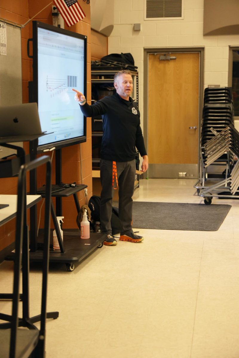 Speaking to the class, Music teacher Patrick Conatan informs the students about music theory. On Nov, 12. Fenton High School held career day during SRT. 