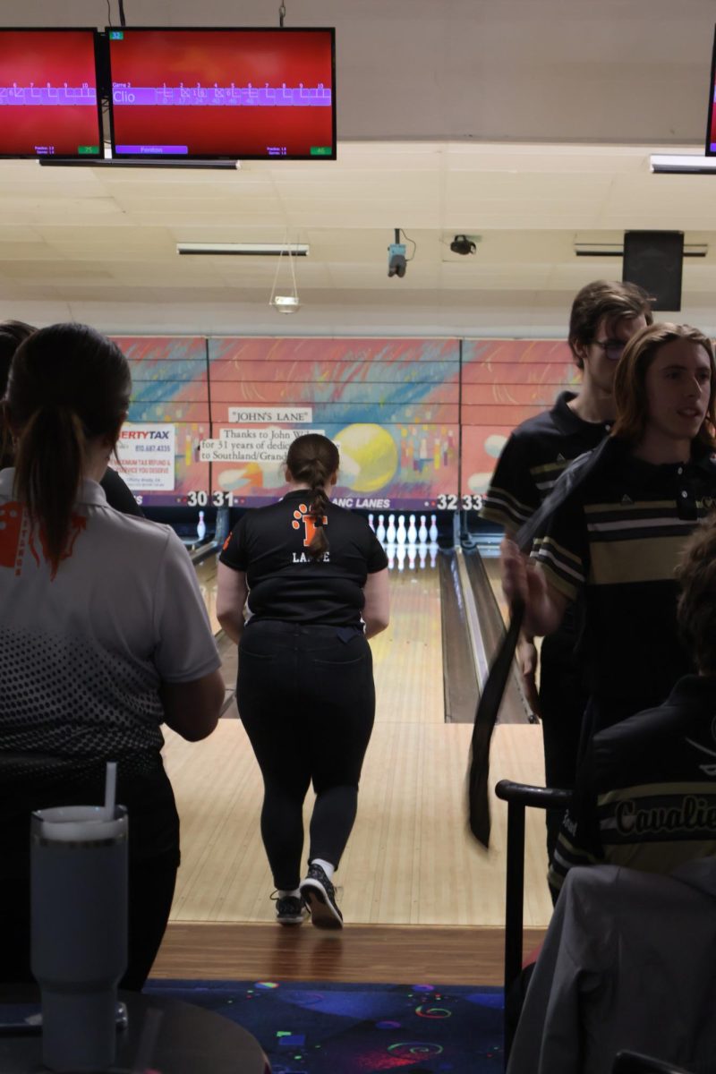 Getting ready to bowl, junior Faith Lampe walked up to the lane. On Jan. 11, the varsity bowling team played against Clio.