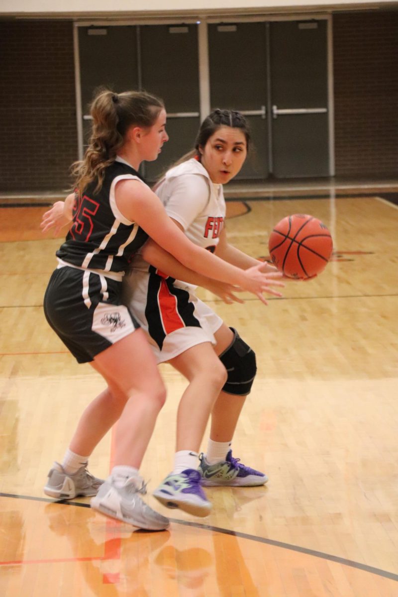 Dribbling the ball, sophomore Maya Richmond looks to shoot. On Jan. 19, the girls JV basketball team played Linden.