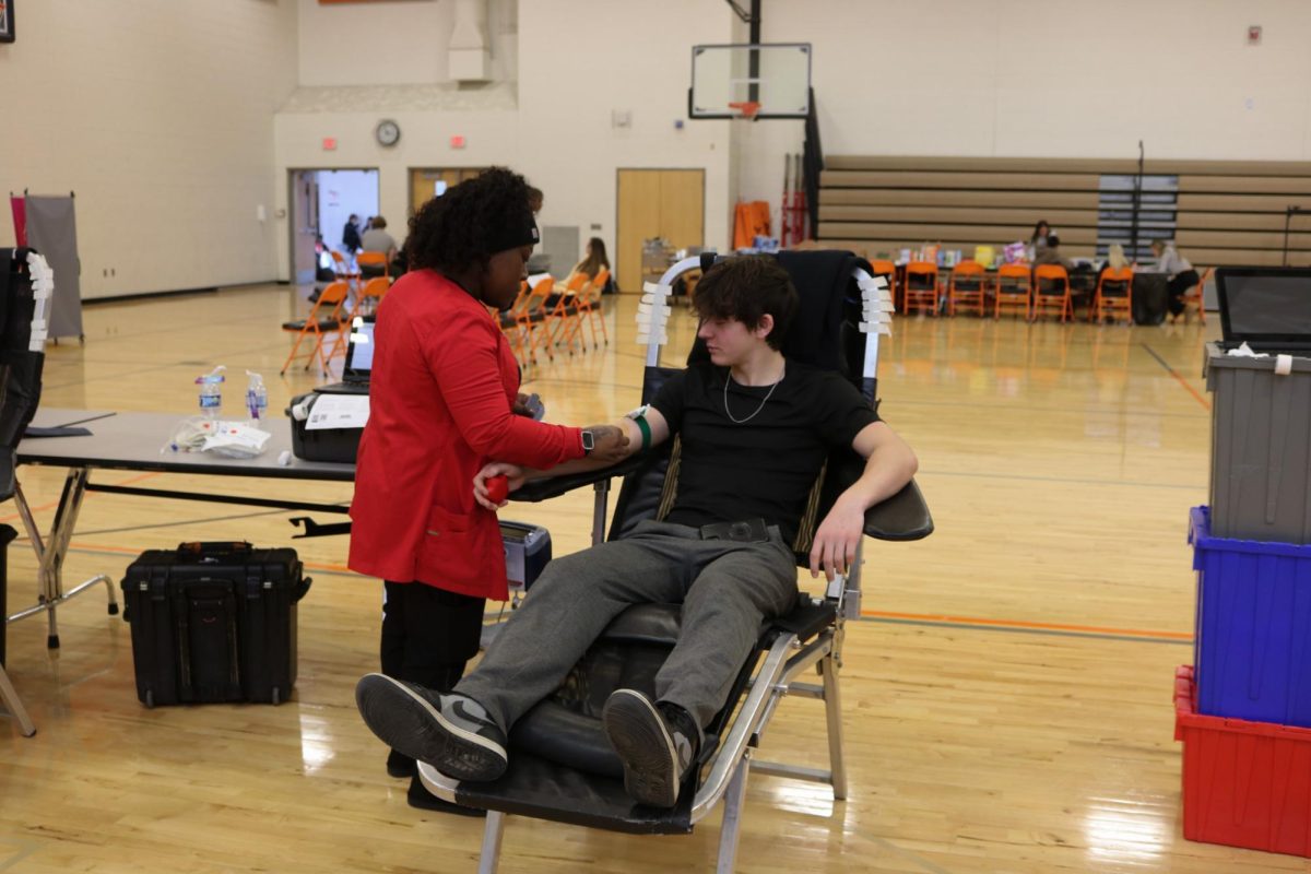 Getting blood drawn, Junior Noah Vetter donates blood to local blood drive. On Feb. 2, Fenton Highschool held their 2nd annual blood drive.