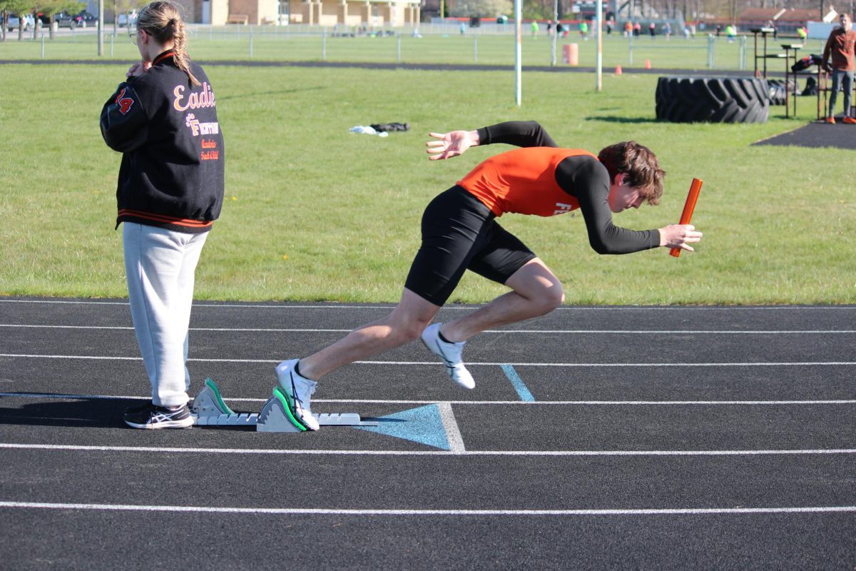 Getting prepared, junior Noah Vetter runs in his race. On Apr. 24, Fenton boys track played against Flushing and won. 