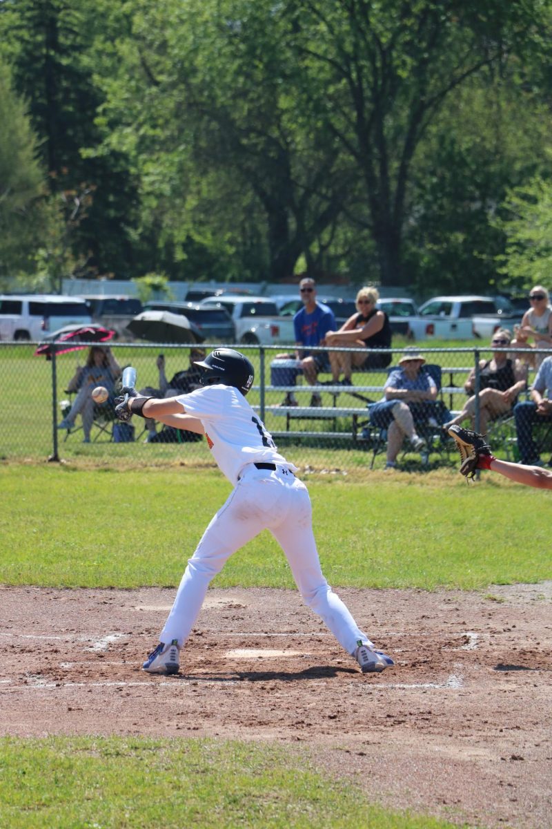  Batting freshman Jackson Star hits a bunt. On May. 18, Fenton freshman baseball team went up against Bay City Western. (find score later)