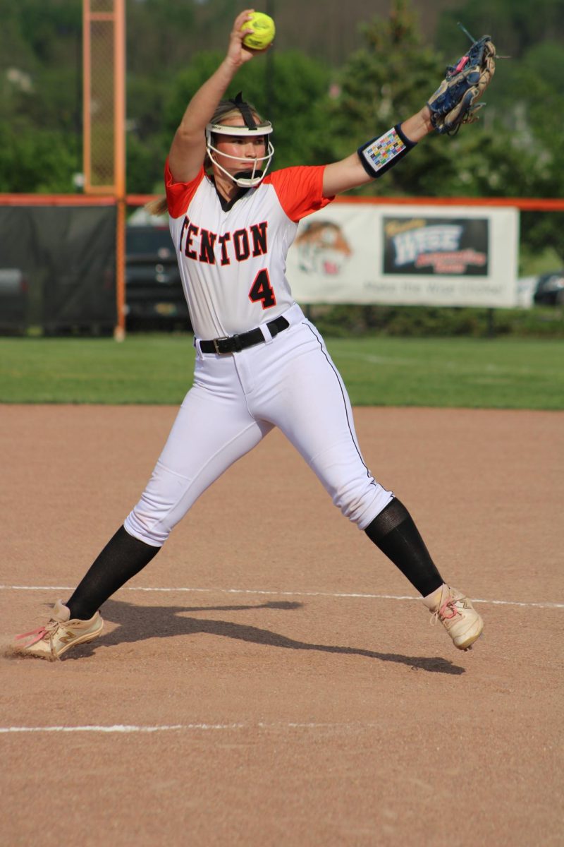 Finishing her motion, junior Lydia Clemons pitches to the batter. On May 21, the junior varsity softball team played Goodrich.