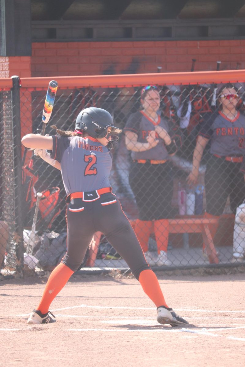 Swinging her bat, junior Taryn Craven hits the ball. On May 15, girls varsity softball competed against Kearsley and won. 