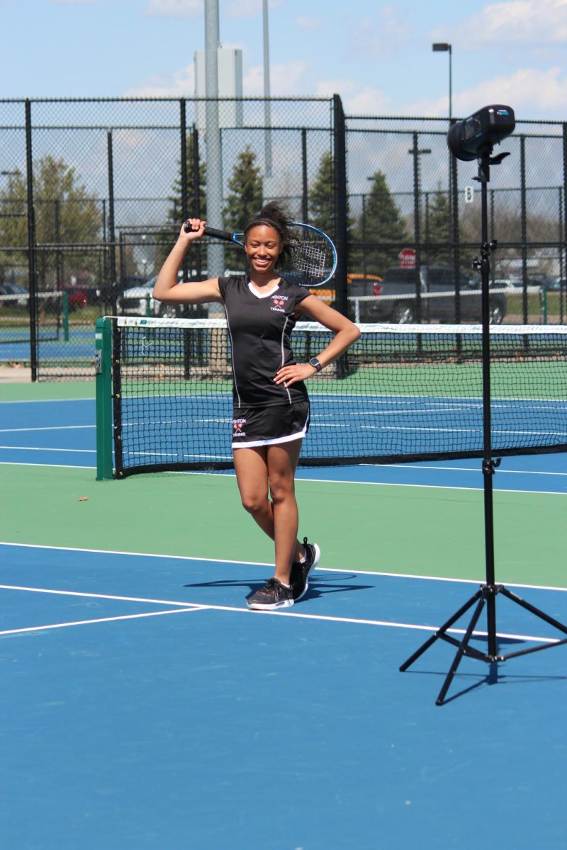 Standing, sophomore Kierstyn Rutley is taking her picture. On May. 1, the Fenton Tennis Team took team pictures. 